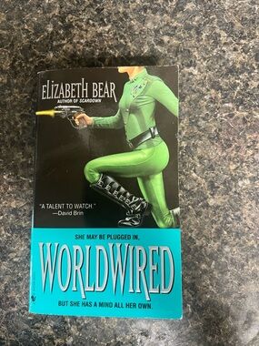 Science Fiction Paperback with Bright Teal Back Cover